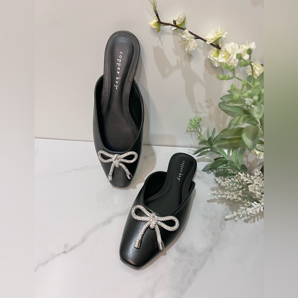 Copper Key Black Mules with Metallic Bow